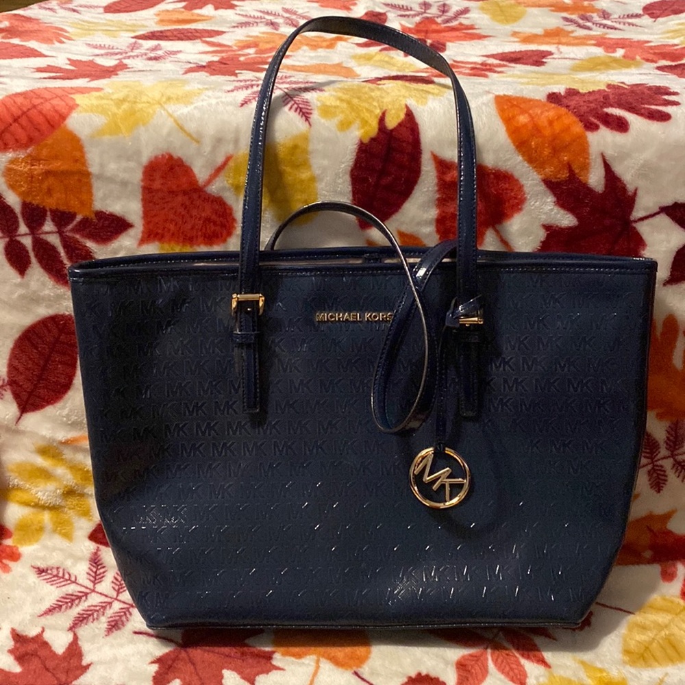Dark blue patent MK purse.